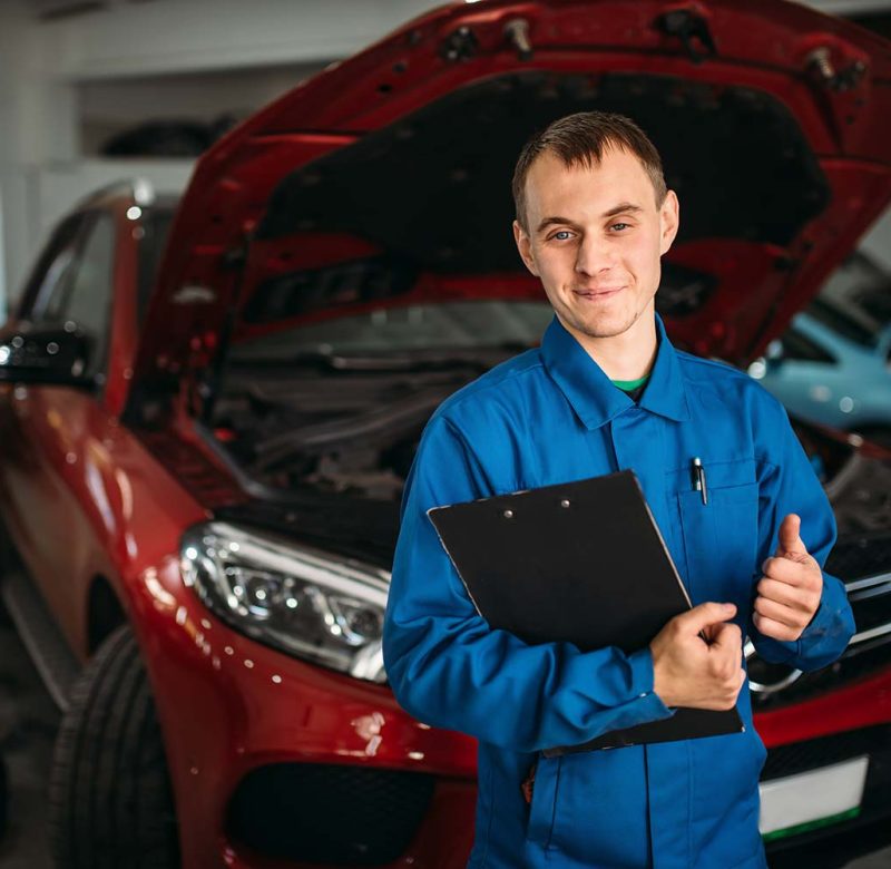 technician-with-notebook-car-with-opened-hood-small.jpg technician-with-notebook-car-with-opened-hood-small.jpg